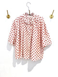 Camisa bolas vermelhas